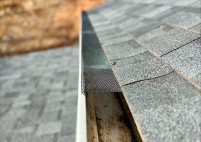 cleaning the gutters, gutter guards are installed